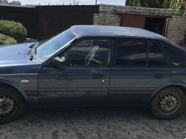 Синій Мазда 626, об'ємом двигуна 2 л та пробігом 350 тис. км за 1290 $, фото 5 на Automoto.ua