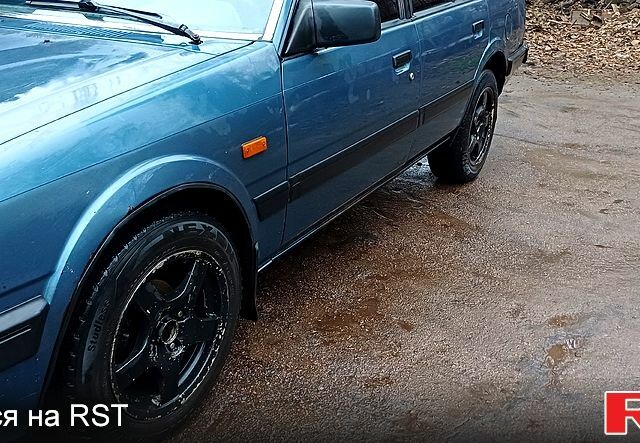 Синій Мазда 626, об'ємом двигуна 2 л та пробігом 348 тис. км за 2000 $, фото 7 на Automoto.ua