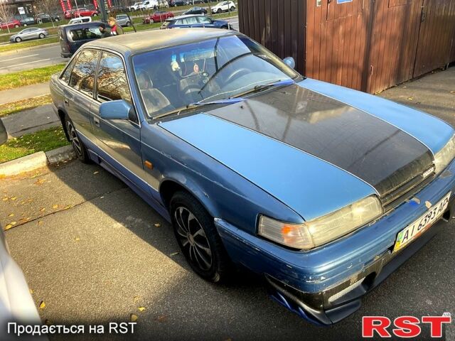 Синий Мазда 626, объемом двигателя 2 л и пробегом 0 тыс. км за 1000 $, фото 1 на Automoto.ua