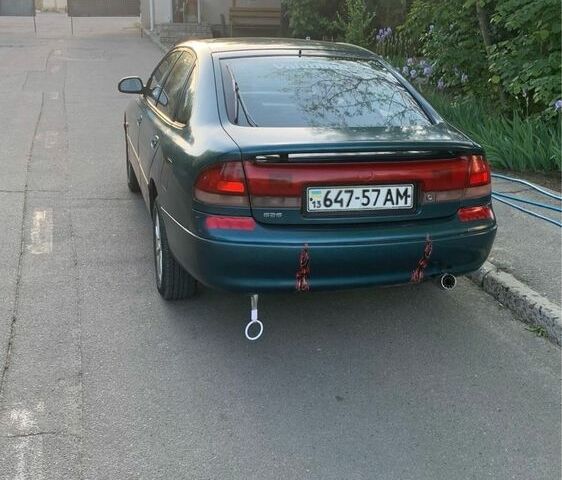 Синий Мазда 626, объемом двигателя 2 л и пробегом 666 тыс. км за 2483 $, фото 2 на Automoto.ua