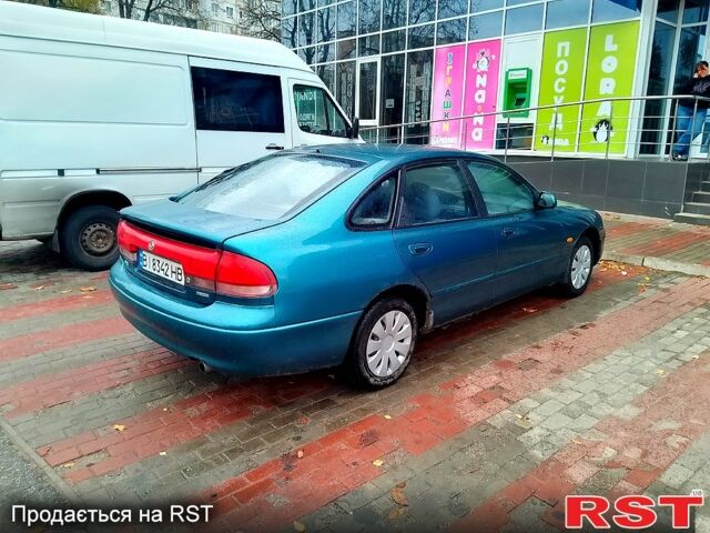 Синій Мазда 626, об'ємом двигуна 2 л та пробігом 0 тис. км за 2030 $, фото 5 на Automoto.ua