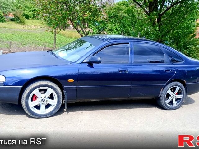 Синій Мазда 626, об'ємом двигуна 1.8 л та пробігом 200 тис. км за 1750 $, фото 3 на Automoto.ua