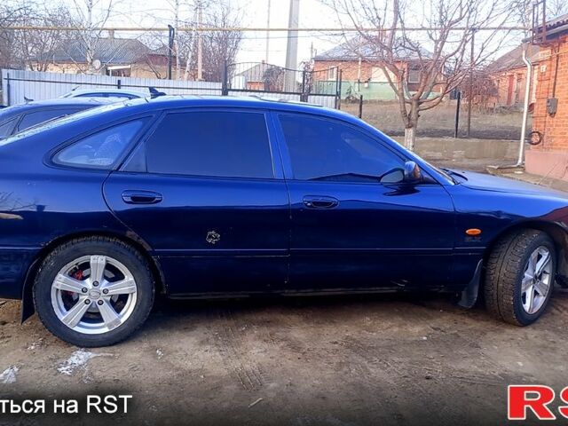 Синій Мазда 626, об'ємом двигуна 1.8 л та пробігом 200 тис. км за 1750 $, фото 11 на Automoto.ua