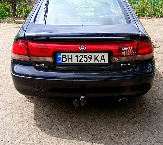 Синій Мазда 626, об'ємом двигуна 1.8 л та пробігом 200 тис. км за 1750 $, фото 5 на Automoto.ua