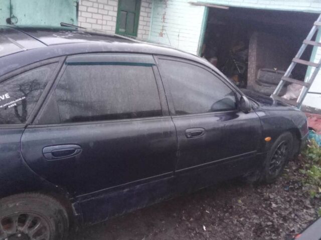 Синий Мазда 626, объемом двигателя 1.9 л и пробегом 3 тыс. км за 2000 $, фото 3 на Automoto.ua