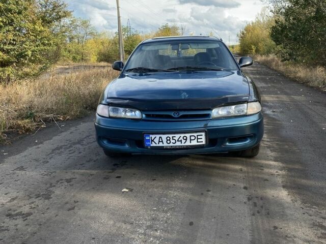 Синий Мазда 626, объемом двигателя 2 л и пробегом 325 тыс. км за 1790 $, фото 5 на Automoto.ua