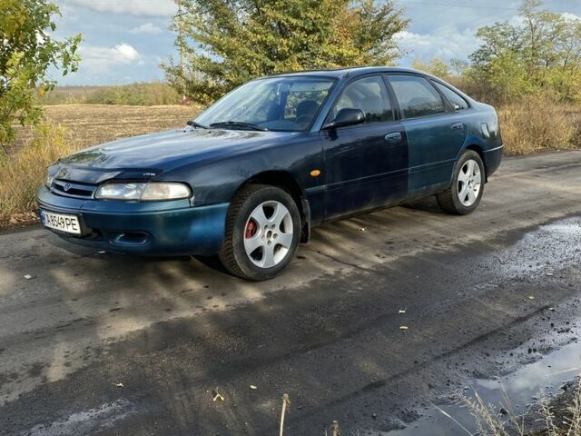 Синий Мазда 626, объемом двигателя 2 л и пробегом 325 тыс. км за 1790 $, фото 4 на Automoto.ua