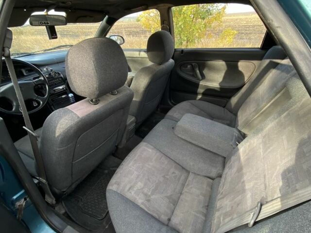 Синий Мазда 626, объемом двигателя 2 л и пробегом 325 тыс. км за 1790 $, фото 11 на Automoto.ua