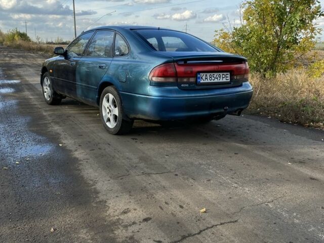 Синий Мазда 626, объемом двигателя 2 л и пробегом 325 тыс. км за 1790 $, фото 1 на Automoto.ua