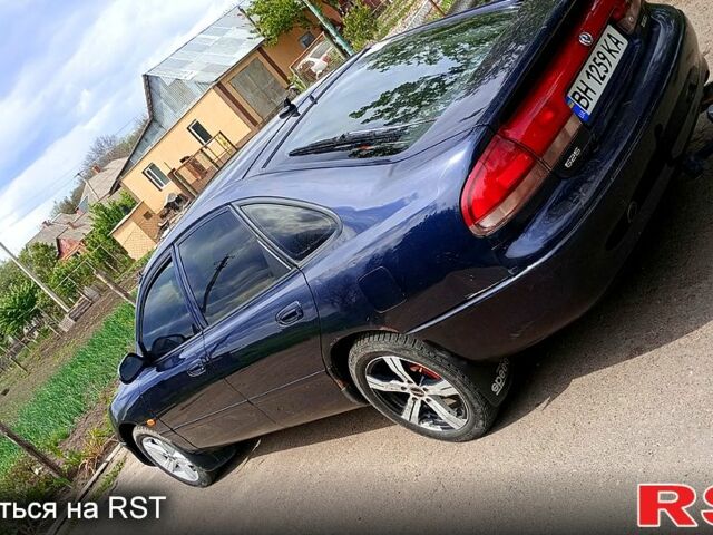 Синій Мазда 626, об'ємом двигуна 1.8 л та пробігом 200 тис. км за 1750 $, фото 4 на Automoto.ua