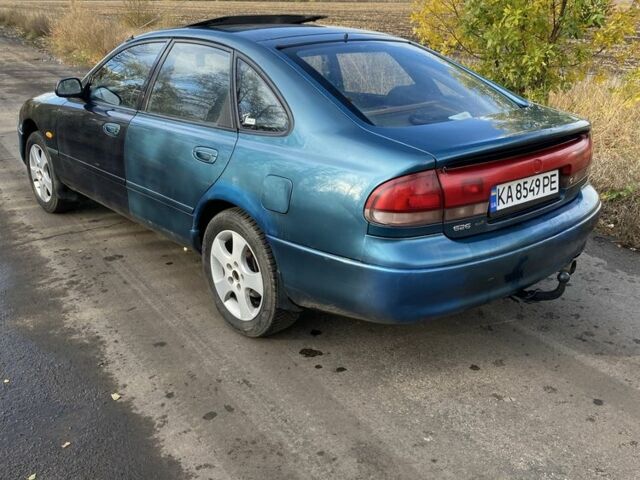 Синий Мазда 626, объемом двигателя 2 л и пробегом 325 тыс. км за 1790 $, фото 6 на Automoto.ua