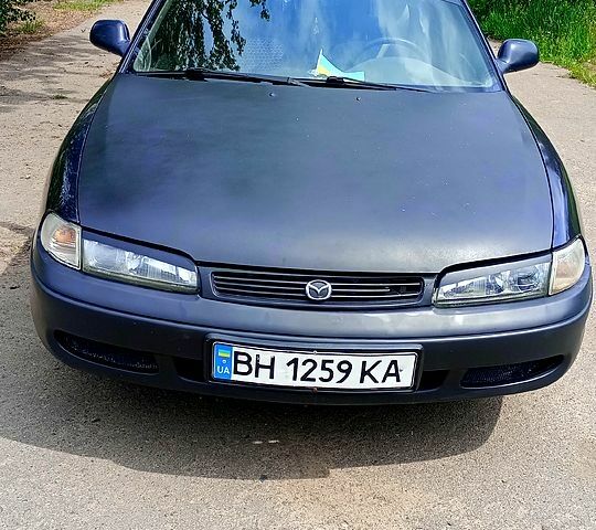 Синій Мазда 626, об'ємом двигуна 1.8 л та пробігом 200 тис. км за 1750 $, фото 7 на Automoto.ua