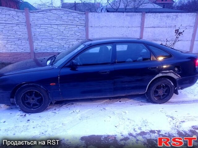 Синий Мазда 626, объемом двигателя 1.8 л и пробегом 1 тыс. км за 1800 $, фото 2 на Automoto.ua