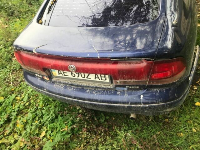 Синій Мазда 626, об'ємом двигуна 1.8 л та пробігом 214 тис. км за 599 $, фото 2 на Automoto.ua