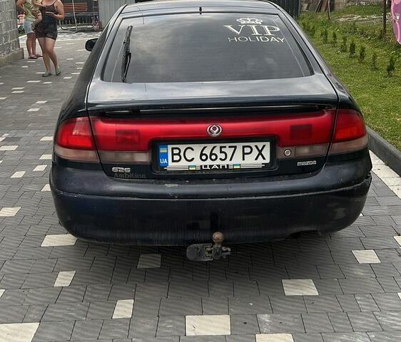 Синий Мазда 626, объемом двигателя 1.8 л и пробегом 350 тыс. км за 1750 $, фото 4 на Automoto.ua