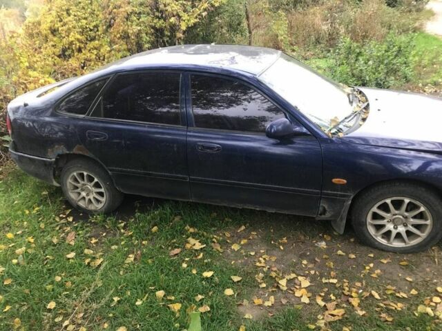 Синій Мазда 626, об'ємом двигуна 1.8 л та пробігом 214 тис. км за 599 $, фото 3 на Automoto.ua