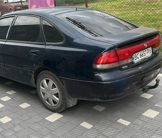 Синий Мазда 626, объемом двигателя 1.8 л и пробегом 350 тыс. км за 1750 $, фото 2 на Automoto.ua