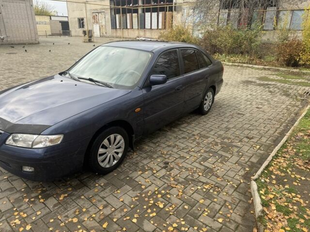 Синий Мазда 626, объемом двигателя 1.8 л и пробегом 346 тыс. км за 1500 $, фото 3 на Automoto.ua