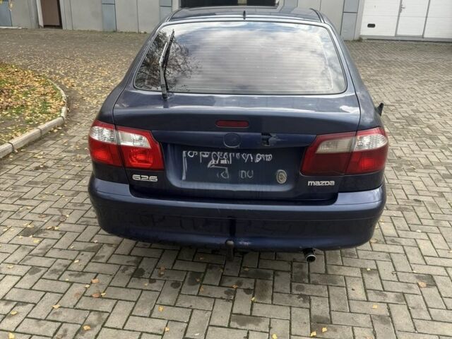 Синий Мазда 626, объемом двигателя 1.8 л и пробегом 346 тыс. км за 1500 $, фото 1 на Automoto.ua
