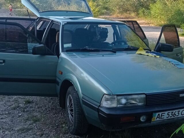 Зеленый Мазда 626, объемом двигателя 2 л и пробегом 250 тыс. км за 1250 $, фото 6 на Automoto.ua
