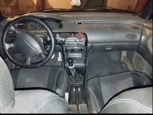 Зелений Мазда 626, об'ємом двигуна 2 л та пробігом 1 тис. км за 2341 $, фото 9 на Automoto.ua