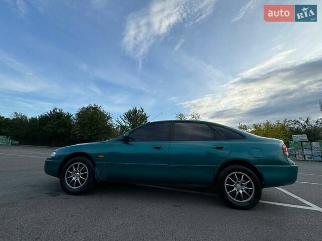 Зеленый Мазда 626, объемом двигателя 1.8 л и пробегом 482 тыс. км за 2000 $, фото 2 на Automoto.ua