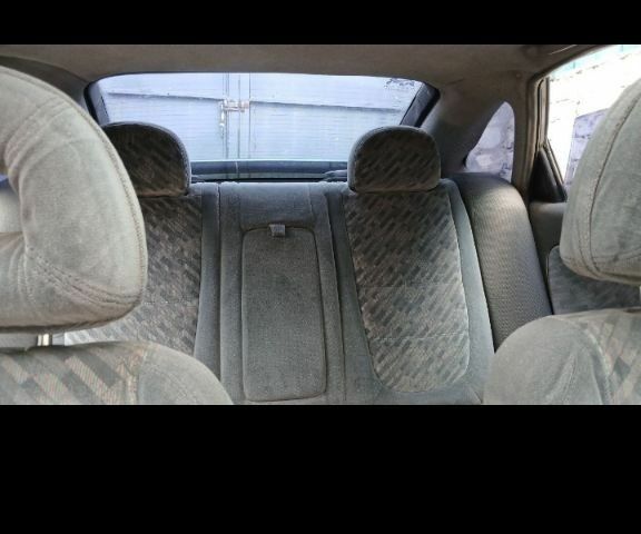 Зеленый Мазда 626, объемом двигателя 2.5 л и пробегом 111 тыс. км за 1200 $, фото 2 на Automoto.ua