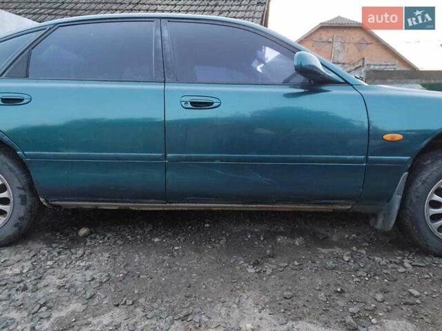 Зелений Мазда 626, об'ємом двигуна 2 л та пробігом 340 тис. км за 1650 $, фото 11 на Automoto.ua