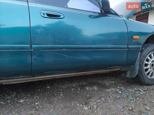 Зелений Мазда 626, об'ємом двигуна 2 л та пробігом 340 тис. км за 1650 $, фото 4 на Automoto.ua