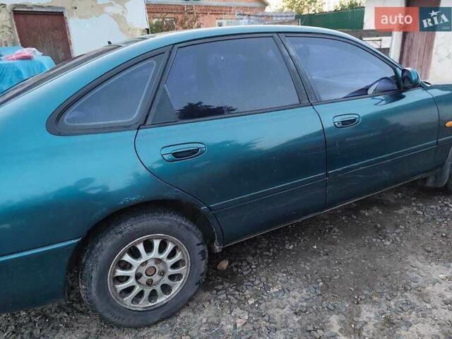 Зелений Мазда 626, об'ємом двигуна 2 л та пробігом 340 тис. км за 1650 $, фото 12 на Automoto.ua