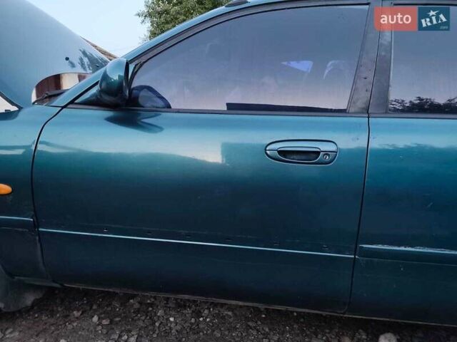 Зелений Мазда 626, об'ємом двигуна 2 л та пробігом 340 тис. км за 1650 $, фото 1 на Automoto.ua