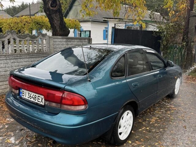 Зеленый Мазда 626, объемом двигателя 2 л и пробегом 3 тыс. км за 1500 $, фото 1 на Automoto.ua