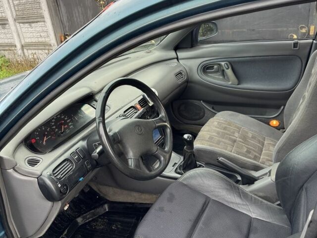 Зеленый Мазда 626, объемом двигателя 2 л и пробегом 3 тыс. км за 1500 $, фото 3 на Automoto.ua