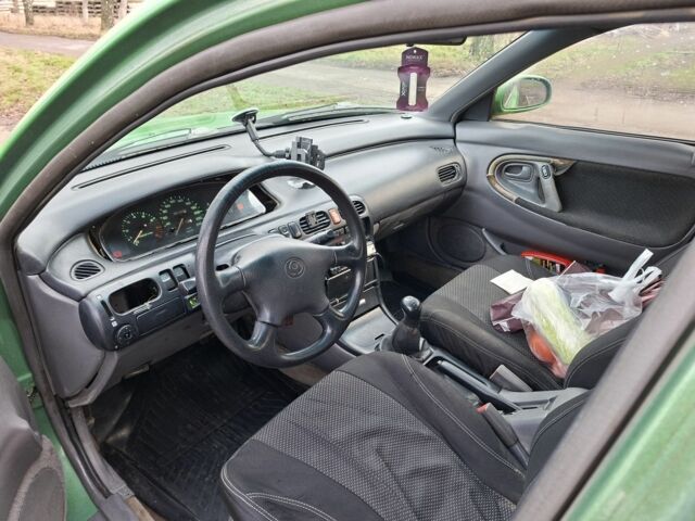 Зеленый Мазда 626, объемом двигателя 2 л и пробегом 531 тыс. км за 1500 $, фото 8 на Automoto.ua