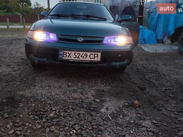 Зелений Мазда 626, об'ємом двигуна 2 л та пробігом 340 тис. км за 1650 $, фото 26 на Automoto.ua