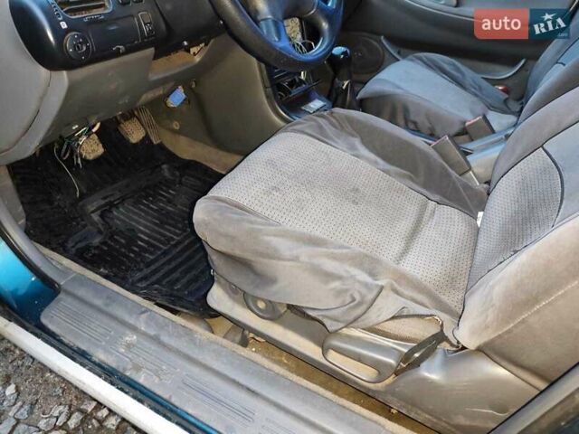 Зелений Мазда 626, об'ємом двигуна 2 л та пробігом 340 тис. км за 1650 $, фото 3 на Automoto.ua