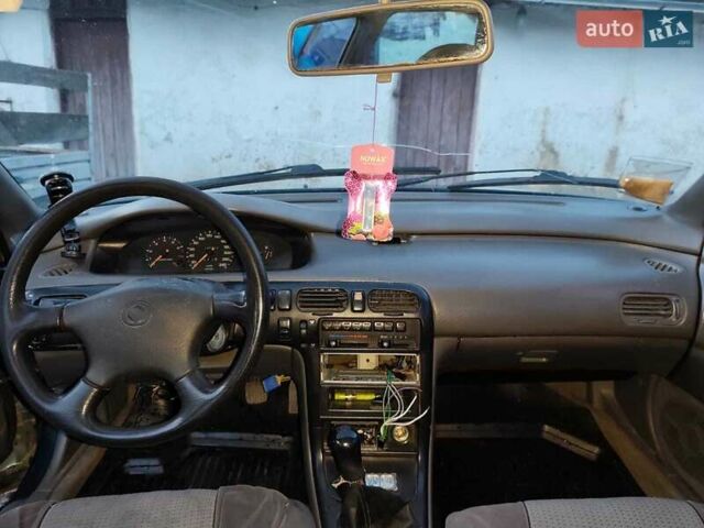 Зелений Мазда 626, об'ємом двигуна 2 л та пробігом 340 тис. км за 1650 $, фото 27 на Automoto.ua