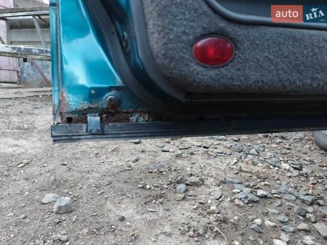 Зелений Мазда 626, об'ємом двигуна 2 л та пробігом 340 тис. км за 1650 $, фото 5 на Automoto.ua