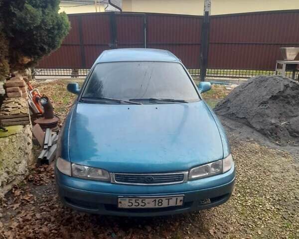 Зеленый Мазда 626, объемом двигателя 2 л и пробегом 250 тыс. км за 2100 $, фото 2 на Automoto.ua