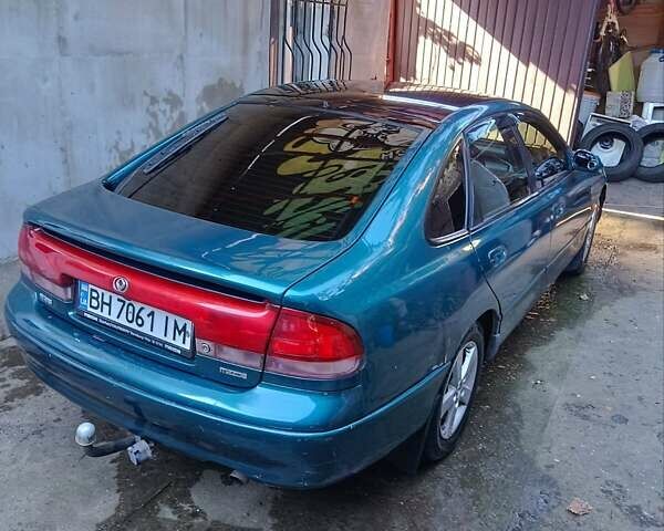 Зелений Мазда 626, об'ємом двигуна 1.79 л та пробігом 393 тис. км за 2300 $, фото 6 на Automoto.ua