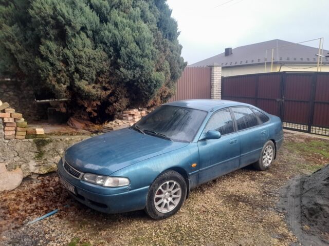 Зеленый Мазда 626, объемом двигателя 2 л и пробегом 345 тыс. км за 51 $, фото 2 на Automoto.ua