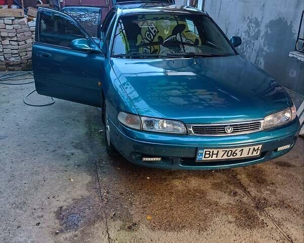 Зелений Мазда 626, об'ємом двигуна 1.79 л та пробігом 393 тис. км за 2300 $, фото 5 на Automoto.ua