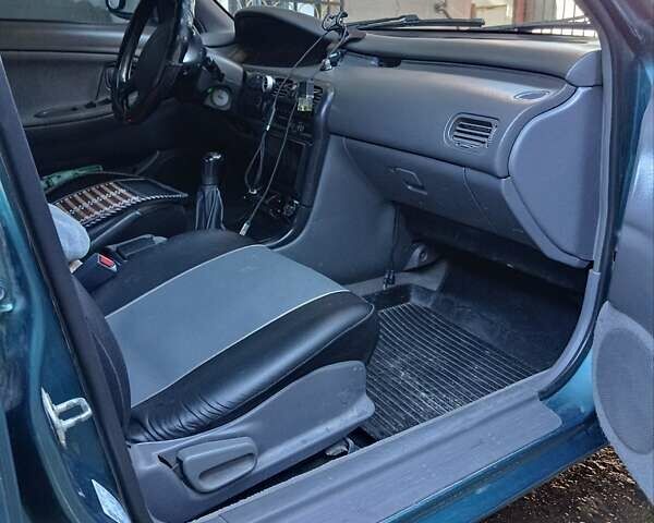 Зелений Мазда 626, об'ємом двигуна 1.79 л та пробігом 393 тис. км за 2300 $, фото 1 на Automoto.ua