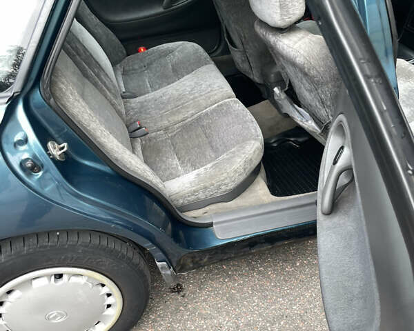 Зеленый Мазда 626, объемом двигателя 1.8 л и пробегом 353 тыс. км за 2000 $, фото 5 на Automoto.ua