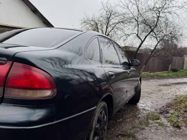 Зелений Мазда 626, об'ємом двигуна 2 л та пробігом 320 тис. км за 1500 $, фото 4 на Automoto.ua