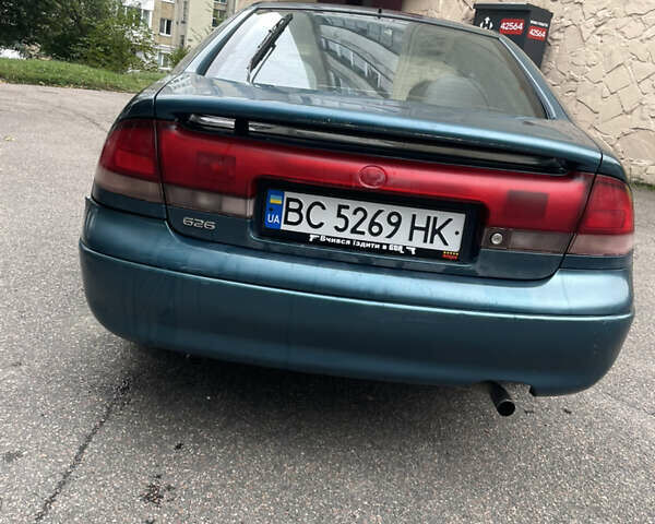 Зеленый Мазда 626, объемом двигателя 1.8 л и пробегом 353 тыс. км за 2000 $, фото 8 на Automoto.ua