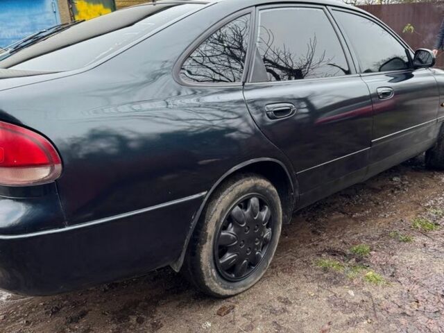 Зелений Мазда 626, об'ємом двигуна 2 л та пробігом 320 тис. км за 1500 $, фото 5 на Automoto.ua