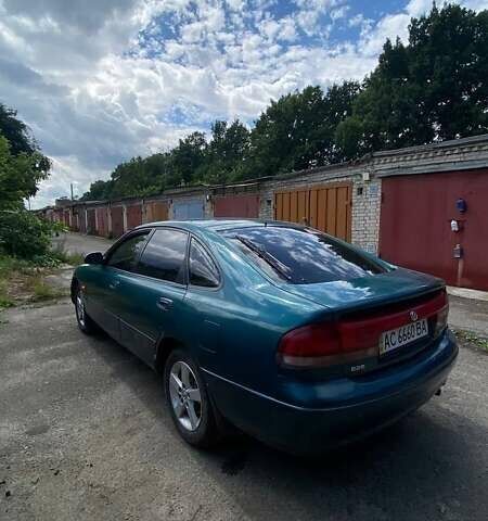 Зеленый Мазда 626, объемом двигателя 1.8 л и пробегом 350 тыс. км за 1070 $, фото 2 на Automoto.ua