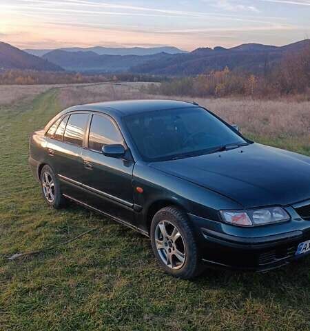 Зеленый Мазда 626, объемом двигателя 1.99 л и пробегом 480 тыс. км за 800 $, фото 2 на Automoto.ua