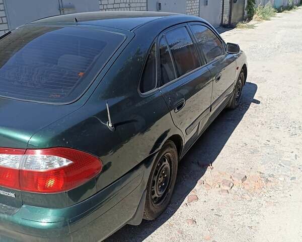 Зеленый Мазда 626, объемом двигателя 2 л и пробегом 280 тыс. км за 1700 $, фото 7 на Automoto.ua